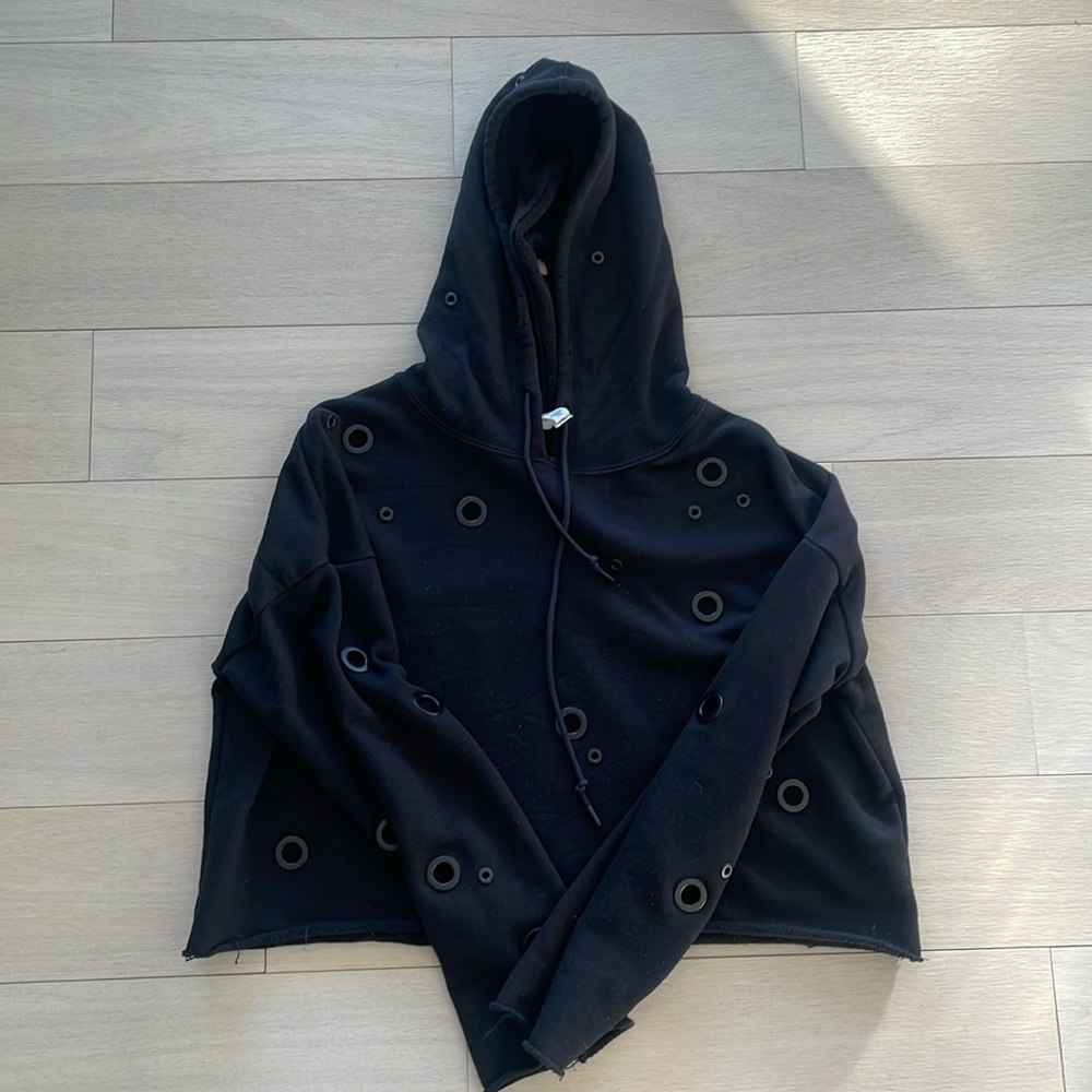 Alo Yoga cropped hoodie with monochrome hole cutouts